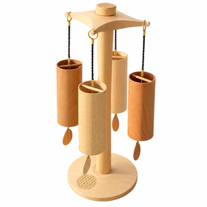 Koshi Earth Symphony set of four wooden wind chimes on Premium Flower of Life rotating stand, angled view on white background